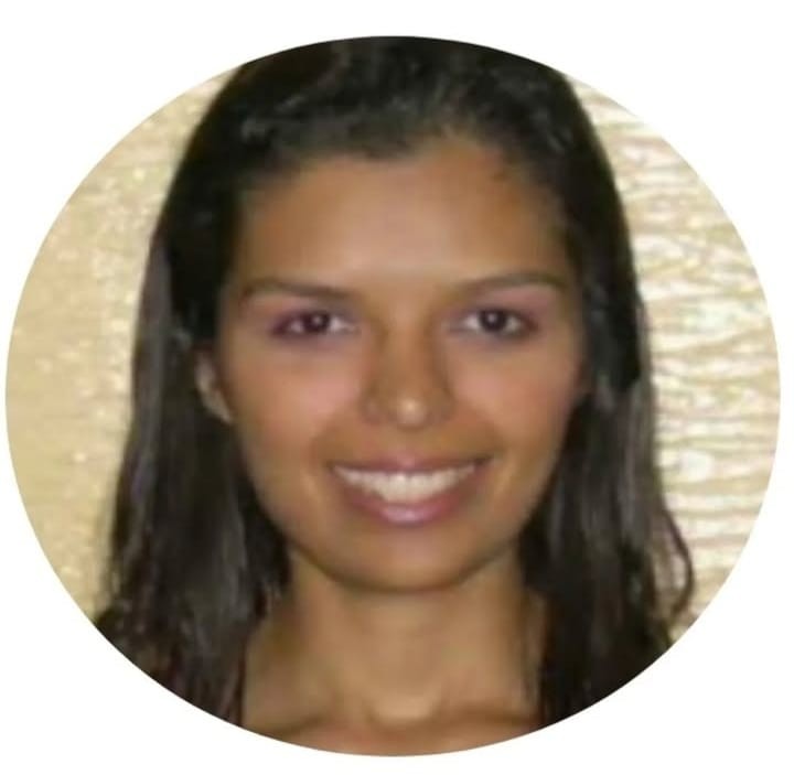 Prof. Dra. Flaviana Andrade Faria